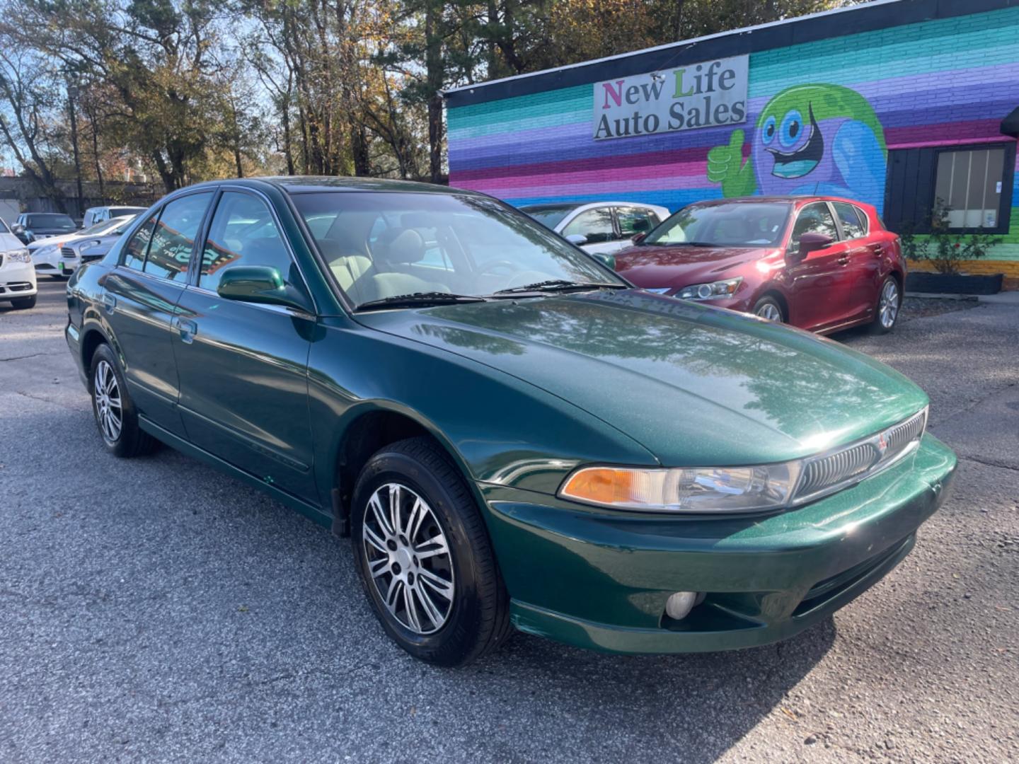 2001 GREEN MITSUBISHI GALANT ES (4A3AA46G31E) with an 2.4L engine, Automatic transmission, located at 5103 Dorchester Rd., Charleston, SC, 29418-5607, (843) 767-1122, 36.245171, -115.228050 - Shimmery Green Exterior, Clean Interior with AM/FM/AUX/USB, Power Windows, Power Locks, Power Mirrors. Runs Great! Only 92k miles!! Located at New Life Auto Sales! 2023 WINNER for Post & Courier's Charleston's Choice Pre-owned Car Dealer AND 2018-2023 Top 5 Finalist for Charleston City Paper's BEST - Photo#0